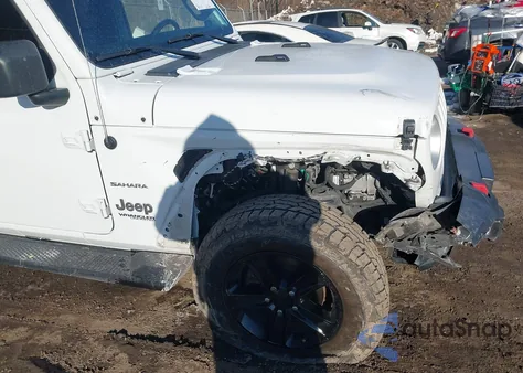 2022 Jeep Wrangler Unlimited Sahara 4X4 z USA, uszkodzony, nr VIN 1C4HJXEN2NW252074